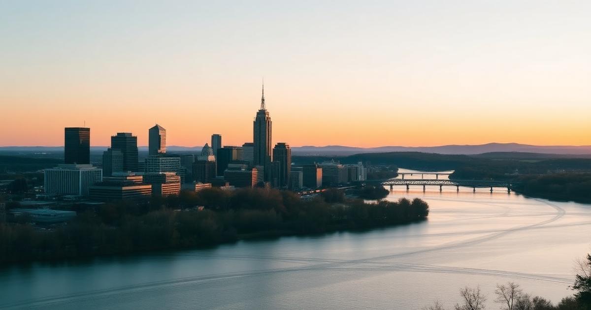 Utica, New York skyline at golden hour above the Mohawk River, representing addiction recovery resources across Oneida County and Central New York.